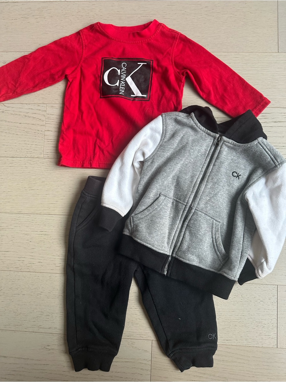 Calvin Klein Kids Red Top with Gray & Black Hooded Jacket and Black Pants